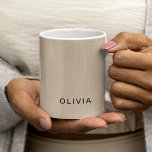 "Personalised Beige Monogram Custom Coffee Mug<br><div class="desc">Sip in style with this personalised beige monogram mug, designed to add a touch of elegance to your morning coffee or tea ritual. Featuring a minimalistic monogram design on a soft beige background, this mug is fully customisable with your initials or name. Crafted from durable ceramic, it’s perfect for everyday...</div>