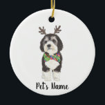 Personalised Bernedoodle Reindeer Bowtie Christmas Ceramic Tree Decoration<br><div class="desc">I am in love with this beautifully detailed watercolor illustration of a grey, black, and white bernedoodle or sheepadoodle on an ornament with a sweet little antler and red & green bowtie combo! Personalise these ornaments and make the nice list this year! For the perfect presents, pair it with a...</div>