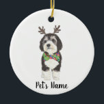 Personalised Bernedoodle Reindeer Bowtie Christmas Ceramic Tree Decoration<br><div class="desc">I am in love with this beautifully detailed watercolor illustration of a grey, black, and white bernedoodle or sheepadoodle on an ornament with a sweet little antler and red & green bowtie combo! Personalise these ornaments and make the nice list this year! For the perfect presents, pair it with a...</div>