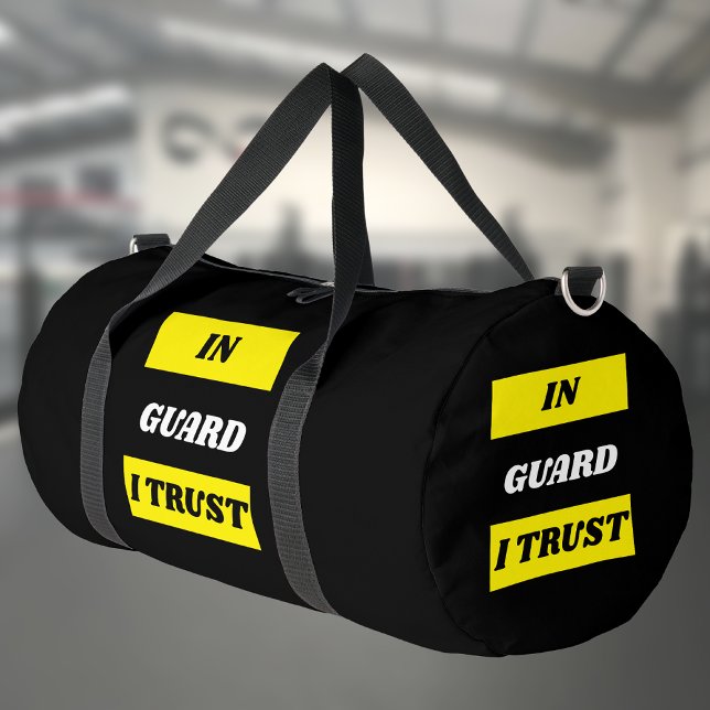 Personalised BJJ In Guard I Trust Jiu Jitsu Duffle Bag (In Guard I trust bag against a gym background.)