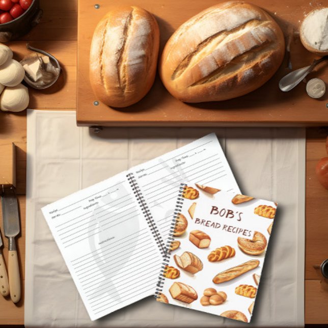 Personalised Bread Recipe Notebook (A bread making recipe book lies on top of a kitchen counter surrounded by bread and supplies.)