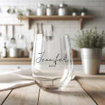 Personalised Bride  Stemless Wine Glass<br><div class="desc">"Toast to the bride in style with this beautifully personalised wine glass! Whether you're celebrating an engagement, bridal shower, or the big day itself, this custom glass is the perfect accessory for the blushing bride. Adorned with delicate floral accents and the bride's name elegantly scripted across the front, it's a...</div>