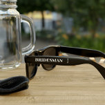 Personalised Bridesman Wedding Party Sunglasses<br><div class="desc">A pair of sunglasses is just what your Bridesman needs for the Bachelorette Party. Just add his name and your wedding date and call it done. Can be used for any member of your bridal party. Please note that the wedding date is small text,  still readable but small</div>