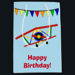 Personalised Cute Aeroplane Medium Gift Bag<br><div class="desc">Here's a cute gift bag that you may personalise for a little boy. It features a colourful aeroplane image with a pennant banner above it. Colours used are bright red, blue, green, and gold. Below the image is your custom text in bright red, and placed on a light blue background....</div>