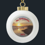 Personalised Dog on Beach at Sunset Ceramic Ball Christmas Ornament<br><div class="desc">This ceramic ball ornament features a California beach with people and a dog splashing in the ocean as the last rays of the sun set. The back has a bell design. With this ornament, you can enjoy a beach sunset anytime. The top of the ocean image has curved text that...</div>