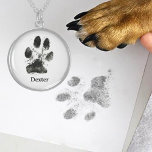 Personalised Dog's Digital Paw Print With Name  Sterling Silver Necklace<br><div class="desc">Celebrate your furry friend with this custom sterling silver necklace featuring a digital paw print and your dog’s name. This beautifully crafted necklace makes a heartfelt keepsake, capturing the unique bond between you and your pet. Made from premium sterling silver, it’s durable, stylish, and hypoallergenic—perfect for everyday wear or gifting...</div>