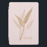 Personalised Elegant Gold Botanical Line Art Pink iPad Pro Cover<br><div class="desc">This delicate botanical design features intricately drawn gold leaves against a soft blush pink background, creating a sophisticated and timeless aesthetic. Inspired by nature’s elegance and minimalist line art, this design is perfect for those who appreciate refined simplicity with a touch of luxury. The subtle yet eye-catching gold colour adds...</div>