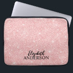 Personalised Elegant Pink Glitter Laptop Sleeve<br><div class="desc">This personalised girly laptop sleeve has your name in black text on a beautiful pink glitter background. Customise the laptop case with the name of your choice to make someone feel extra special. Makes a fun gift for birthdays or for Christmas, and perfect for back to school. Designed for you...</div>