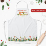 Personalised Family Merry Little Christmas Apron<br><div class="desc">Gorgeous holiday apron with ability to add your family name! Unique design with area for your name/family name showcased by beautiful holiday cookies spelling "Merry Christmas". Ability to keep, remove or change "little" from "Merry little Christmas" phrase. Lower area with exquisite festive border with Christmas trees holiday cookies, greenery, hollies,...</div>