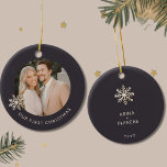 Personalised First Christmas Ornament<br><div class="desc">Celebrate a special milestone with this Personalised First Christmas ornament. Cherish your first holiday together as a couple with this exquisite ornament featuring a customisable photo framed by a delicate champagne gold snowflake on a rich dark background. The front elegantly displays 'Our First Christmas' in the lower thirds, capturing the...</div>