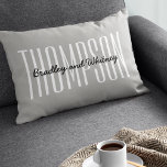 Personalised Gift Modern Grey Family Name Lumbar Cushion<br><div class="desc">Simple modern family home pillow featuring a classic grey background,  your last name in a large clean typeface and your first names.

Everything on this pillow can be customised to suit the style of your home,  this would be a cool gift for newlyweds.</div>