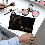 Personalised Gold Black Script Name Makeup Bag<br><div class="desc">Elevate your bridal party's style with our bridesmaid gifts makeup bag for her! These chic and practical makeup bags are the perfect token of appreciation for your bridesmaids. Delight them with a personalised touch by adding their names. With ample space for all their beauty essentials, these makeup bags are ideal...</div>