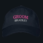 Personalised Groom Bachelor Party Custom Embroidered Hat<br><div class="desc">Add a name and the role to play at the wedding by clicking the "Personalised" button. This chic and stylish cap serves as the perfect memento of a memorable getaway with your favourite buddies. The front of the cap showcases a captivating sports-inspired "Groom" typography that perfectly captures the fun and...</div>