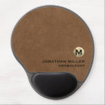 Personalised Leather Print Ergonomic Mousepad Gel Mouse Mat<br><div class="desc">Elevate your workspace with this personalised brown leather print ergonomic mousepad. The smooth surface provides precise tracking for your mouse, while the wrist support helps to reduce strain and discomfort during extended use. The design features a luxurious brown leather print and a gold monogram medallion with your name and title....</div>