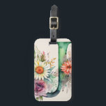 Personalised Letter J Daisy Floral Watercolor  Luggage Tag<br><div class="desc">Travel in style with our Personalised Letter J Watercolor Luggage Tag. Designed to add a touch of elegance to your journey, this luggage tag features a bold "J" adorned with exquisite watercolor art in jewel tones and complementary pastels. The front of the tag showcases delicate flowers and leafy greens that...</div>