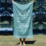 Personalised Life Is Better At The Lake Beach Towel<br><div class="desc">Upgrade your outdoor setup at your lakeside abode with this cute personalised beach towel featuring the phrase "life is better at the lake" in white lettering accented with an anchor and an oar. Personalise with your family name and/or year established beneath. Perfect for lake house housewarming parties, summer homes, or...</div>