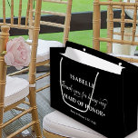 Personalised Maid of Honour Black White Thank You Large Gift Bag<br><div class="desc">Personalised maid of honour gift bag with a black and white colour palette. The name template is set up ready for you to add the maid of honour's name as well as the bride & groom's names and wedding date. The thank you wording reads "Thank you for being my maid...</div>