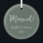 Personalised Married Couple Handwritten Green Glass Tree Decoration<br><div class="desc">Celebrate your first Christmas as a married couple with this personalised boho green glass ornament. Featuring a charming handwritten script, this ornament beautifully displays the names of the bride and groom, along with the year. The earthy green tone adds a touch of natural elegance, making it a perfect keepsake for...</div>