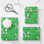 Personalised Merry Christmas Green Monogram Wrapping Paper Sheet<br><div class="desc">A personalised "Merry Christmas" monogram design with a Xmas green background colour. An ideal festive custom design for the holiday season. Customise the monogram and make it your own!</div>