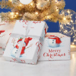 Personalised Merry Christmas Snowman Custom Year  Wrapping Paper<br><div class="desc">Bring festive joy to every gift with this Merry Christmas snowman wrapping paper design for 2026! Featuring an adorable, smiling winter snowman with a cosy red scarf and knitted hat, this cute seasonal illustration creates a heart-warming and cheerful holiday aesthetic. Perfect for Christmas presents, Secret Santa surprises, winter birthdays, holiday...</div>