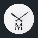 Personalised Monogram and Name Round Clock<br><div class="desc">Personalised Monogram and Name Gifts
featuring personalised monogram in classic serif font style with box of name in the middle of monogram.

Perfect as home decors,  housewarming gifts,  holiday gifts for family,  newlyweds and more.</div>