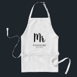 Personalised Mr Wedding Groom Black and White Standard Apron<br><div class="desc">This keepsake wedding apron celebrates his wedding day with the word "Mr" in large black calligraphy letters,  along with her new last name and the wedding date in classic serif font. See our Zazzle store for matching "Mrs" apron for the bride.</div>