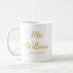 Personalised Mrs Est Newlywed Bride Gift Custom Coffee Mug<br><div class="desc">personalised mrs est your date,  engagement gift for bride wedding,  present for bride wedding gift,  monogram last name newlywed modern,  bachelorette party mrs newly engaged,  bridal shower recently married mug,  bride mug fiancee birthday gift,  custom personalise her calligraphy cup,  just married trendy simple script,  cute gold and white typography</div>