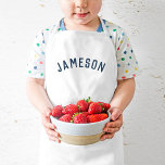 Personalised Name Monogram | Navy Kids Apron<br><div class="desc">These personalised kids' aprons feature your child's name in a modern arched font, making them perfect for young chefs helping in the kitchen, creative dress-up play, or as artist smocks to protect clothes during crafting. Made from durable, easy-to-clean fabric, these aprons add a fun, personal touch while keeping your little...</div>