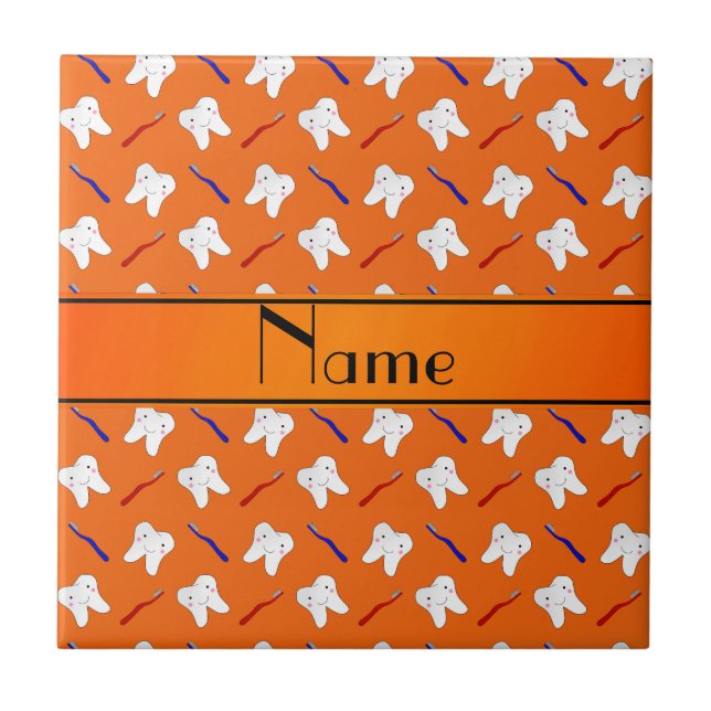 Personalised name orange brushes and tooth pattern tile (Front)