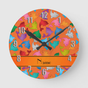 Personalised name orange rainbow dolphins round clock