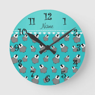 Personalised name turquoise baby penguins round clock