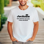 Personalised Name White Class of 2025 Graduation T-Shirt<br><div class="desc">Modern white custom graduation t-shirt design features the graduate's first name in bold black decorative style with grad cap accent (can be re-positioned if needed) and minimal class year and school name wording that can be personalised with your grad's information. Note, the tee shirt colours and style can all be...</div>