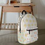 Personalised Pastel Sunshine Printed Backpack<br><div class="desc">This Kids School Backpack is a real dream come true for children, featuring subtle pastel shades of green, yellow, pink, and cream. The bag is adorned with sunshines, hearts, and rainbows, making it a cheerful and eye-catching addition to any school outfit. Not only is it aesthetically pleasing, but it's also...</div>