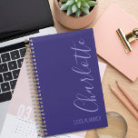 Personalised Purple Simple Modern Chic Planner<br><div class="desc">Chic, modern, simple and personalised purple planner. Design features your name in trendy script calligraphy positioned sideways to the right, year planner on the bottom right corner. This beautiful planner or appointment book will make a fabulous accessory for your office, school or home desk. Personalise with your name or favourite...</div>