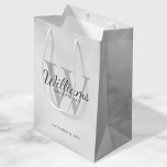 Personalised Script Groomsmen's name and Monogram  Medium Gift Bag<br><div class="desc">Add a personal touch to your wedding with personalised groomsmen gift bag. This gift bag features personalised groomsman's name in grey classic script font style with wedding details in grey classic serif font style and monogram in light grey classic serif font style as background, on white marble background. Also perfect...</div>