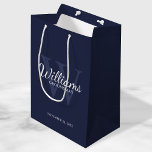 Personalised Script Groomsmen's name and Monogram  Medium Gift Bag<br><div class="desc">Add a personal touch to your wedding with personalised groomsmen gift bag. This gift bag features personalised groomsman's name in white classic script font style with wedding details in white classic serif font style and monogram in light navy blue classic serif font style as background, on navy blue background. Also...</div>