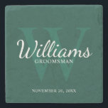 Personalised Script Groomsmen's name and Monogram  Stone Coaster<br><div class="desc">Add a personal touch to your wedding with personalised groomsmen stone coaster. This coaster features personalised groomsman's name in white classic script font style with wedding details in white classic serif font style and monogram in light emerald green classic serif font style as background, on emerald green background. Also perfect...</div>