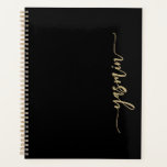 Personalised Stylish Signature Black Gold Planner<br><div class="desc">Personalise this elegant modern design with your name in vertical gold-coloured signature handwriting script on a black background. (To keep the swashes at the beginning and end of the name,  replace only the letters,  leaving the symbols in place.)</div>