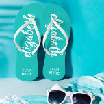Personalised Team Bride Turquoise and White Flip Flops<br><div class="desc">Turquoise and white - or any colour - flip flops personalised with your name and "Team Bride" or any wording you choose. Great bridesmaid gift, bachelorette party, flat shoes for the wedding reception, or a fun bridal shower favour. Change the colour straps and footbed, too! More colours done for you...</div>