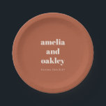 Personalised Terracotta Rust Fall Retro Wedding Paper Plate<br><div class="desc">Celebrate your big day with style using this modern terracotta wedding paper plate featuring bold,  minimalist typography and a warm earthy tone. Personalised with names and date,  it’s a perfect touch for rustic,  boho,  or outdoor receptions,  rehearsal dinners,  or engagement parties. A chic and practical choice for casual elegance.</div>