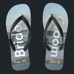 Personalised Wedding Beach Sand Flip Flops<br><div class="desc">Pretty Blue Sky with Light Fluffy White Clouds, Blue Sea, Crashing Ocean Waves and Beach Sand. Unisex Flip Flops with Bride and Groom Date of Marriage written in a white colour text. PERSONALIZE with your text on left and right feet, (or delete text to only show image). The wedding date...</div>
