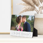 Personalised Wedding Photo Plaque<br><div class="desc">Elegant wedding photo plaque features your favourite horizontal or landscape orientated wedding photo. Your surname or family name appears beneath in chic grey with your names and wedding date overlaid on a transparent white band.</div>