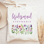Personalised Wildflowers Purple Script Bridesmaid Tote Bag<br><div class="desc">This simple,  elegant tote bag features a border of wildflowers in shades of purple and pink with green stems. The word "bridesmaid" appears in purple handwriting script. Personalise it with her name in sans serif font. Makes a perfect bridesmaid gift!</div>
