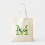 Personalizable green monogram wedding tote bags<br><div class="desc">Personalised apple green monogram wedding tote bag for bride's crew. Elegant name logo design with monogrammed letter initial and stylish script calligraphy typography. Cute vintage gift idea for bride to be and brides entourage. Make one for bridesmaids, maid of honour, matron of honour, mother of the bride, mother of the...</div>