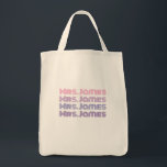 Personalizable wedding bride tote bag<br><div class="desc">easy to personalise!

let the world know your new name!

perfect gift for
honeymoon
wedding
engagement
bridal shower
newlywed 

change the name... .or use the design tool and make further changes to colour as desired</div>