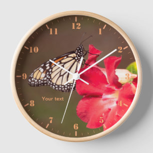 Personalize Monarch butterfly on desert rose Clock