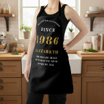 Personalized 40th Birthday 1986 Black & Gold Apron<br><div class="desc">Celebrate four decades of fabulousness with our stylish and personalized 50th Birthday Apron! This elegant black apron features a bold "SETTING THE STANDARDS SINCE" design with a prominent "1986" (or your chosen year) in gold. Below, you can customize it with a name like "ELIZABETH" and a heartwarming phrase: "ADMIRED BY...</div>