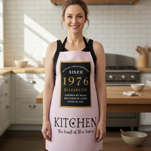 Personalized 50th Birthday Cook Chef Baker Pink Apron (1976 birthday apron worn in a kitchen)