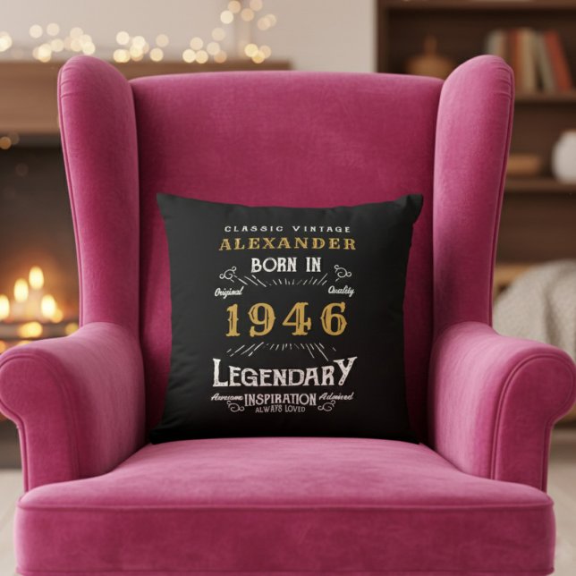 Personalized 80th Birthday Born 1946 Legend Black Cushion (Born 1946 throw pillow on a pink chair.)