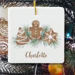 Personalized Christmas Gingerbread Ceramic Ornament<br><div class="desc">This Christmas ornament is decorated with watercolor Christmas gingerbread cookies and foliage.
Easily customizable with your name or monogram.
Because we create our artwork you won't find this exact image from other designers.
Original Watercolor © Michele Davies.</div>